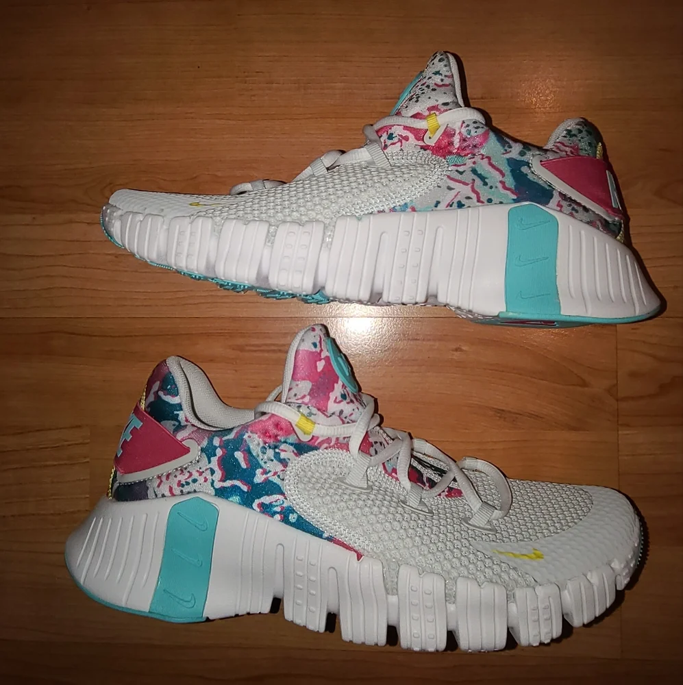 Nike White Sneakers with Teal, Pink and Yellow Accents